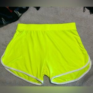 Neon Green shorts with 2 white stripes on both sides